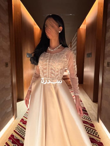 فستان سهرة بيج بتطريز