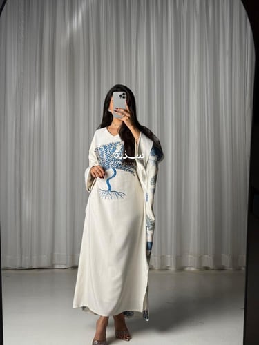جلابية لينن مطرزة برنت بالخلف