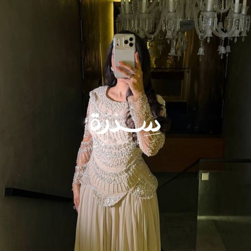 فستان سهرة بتطريز فاخر بالخرز