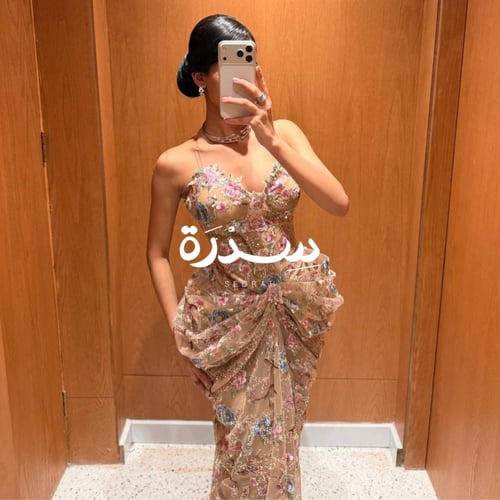 فستان سهرة بتول ناعم مزين بتطريزات