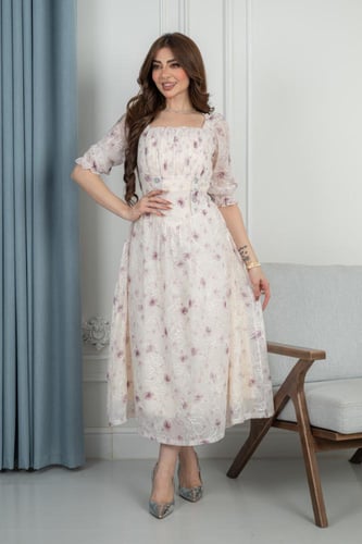 فستان عيد ميدي ناعم بنقوش زهور رقيقة وتفاصيل مطرزة