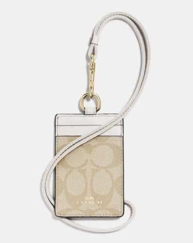 اي دي هولدر ماركة كوتش لون ابيض كريمي