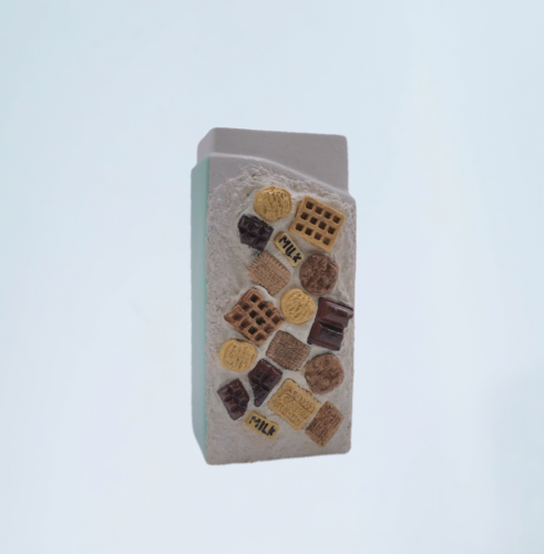 Chocolate and cookies on a green ceramic masterpiece