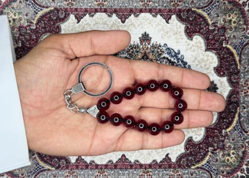 ميدالية بكلايت أحمر شفاف