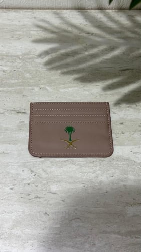 محفظه جلد ب شعار سيفين ونخلة