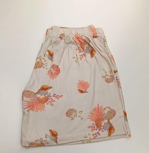 بجامه نسائي برتقالي فاتح 3 قطع مطبوعة