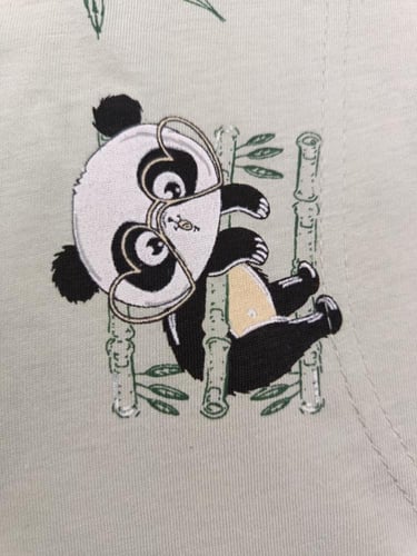 بجامه نسائي اخضر فاتح بطبعة باندا