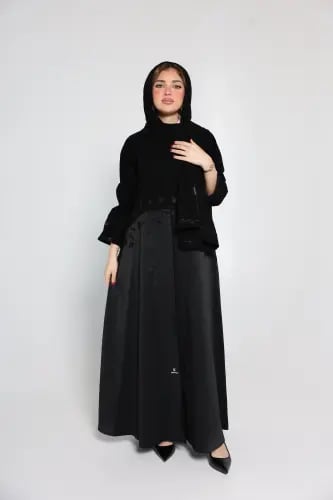 عباية كريب فاخرة بسواد فاحم وتفته سافانا بأكمام مط...