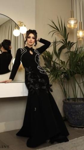 فستان اسود موزد