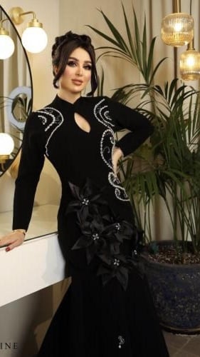 فستان اسود موزد