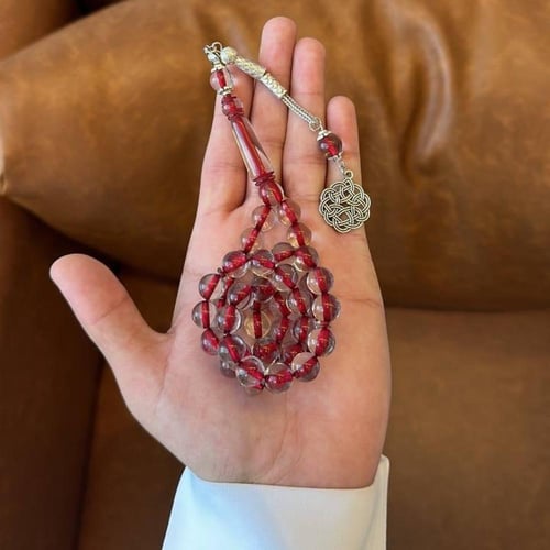 سبحة بكلايت شفافة خيط احمر