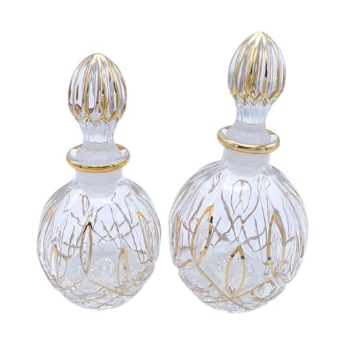 -زجاج عطور ذات شكل بيضاوي,مزين بنقوش فنية فريدة با...