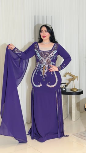 The luxurious purple crepe dress