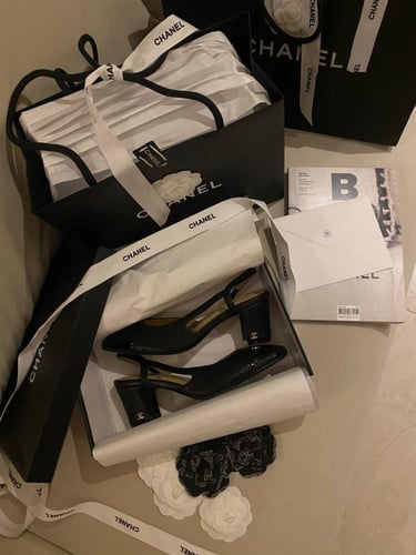 Black Leather and Fabric Cap Toe CC Slingback heel...