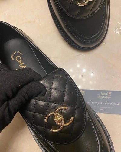 Chanel Black Leather Quilted CC Rotary Lock Flat L...