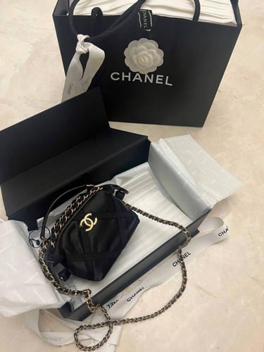 Chanel clutch bag with quilted design and nylon te...