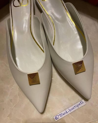 Valentino Garavani Roman Calfskin Mules with Pyram...