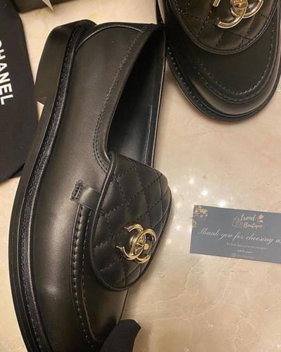 Chanel Black Leather Quilted CC Rotary Lock Flat L...