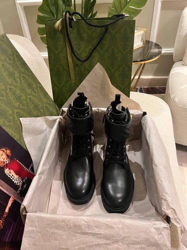 Luxurious brown Gucci boots with GG beige logo and...