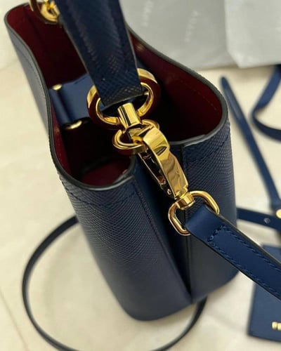 Prada bag, first class, in a blue brand box