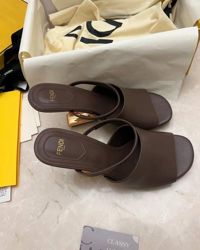 First Black Leather Heel Sandals