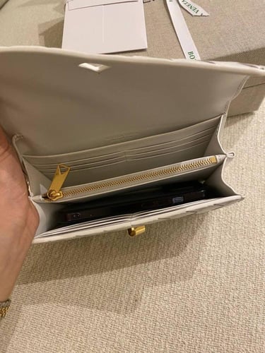 Botte Long clutch with top handle in braided leath...