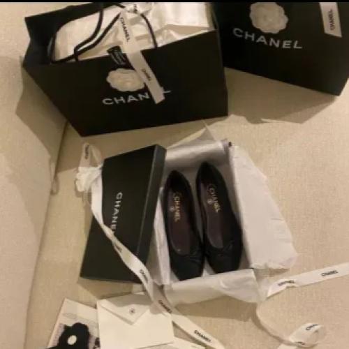 Black Chanel ballerina loafers