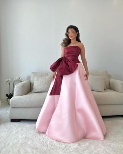 فستان وردي بفيونكه انيقه