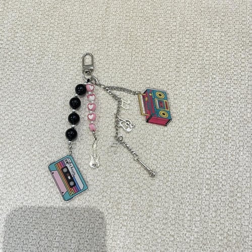 تعليقة موسيقا للشنطة أو الجوال