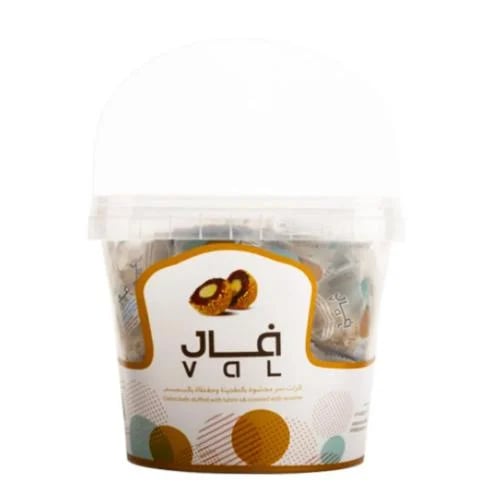Date ball fortune filled with tahini and covered w...