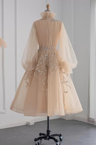 فستان ميدي ذهبي