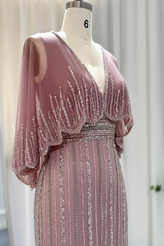 فستان وردي مع شك و اكمام