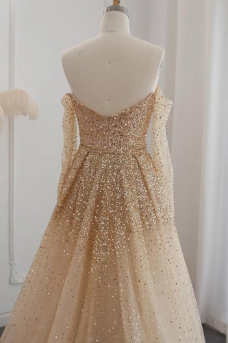 RC93 - فستان ذهبي كلوش اوف شولدر