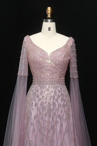 فستان شك وردي مع اكمام كيب