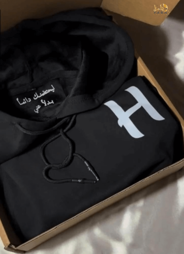 هودي ليحتضنك دائماً بدلاً عني – بحرف