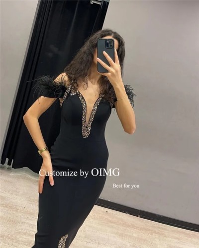 فساتين سهرة من OIMG باللون الأسود غير اللامع على ش...