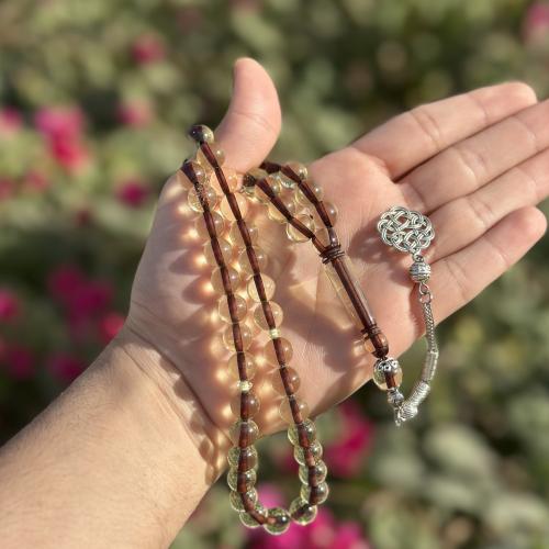 سبحة بكلايت شفاف مع خيط بني