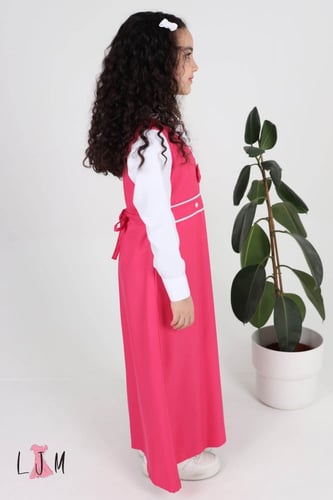 شيال مريول ابتدائي ببيونه مع ازرار وردي 1070 بدون...