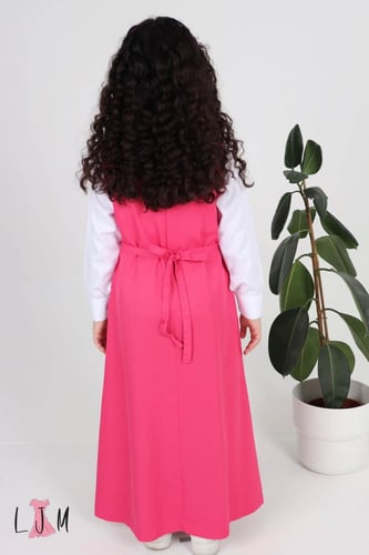 شيال مريول ابتدائي ببيونه مع حزام وازرار وردي 1001...