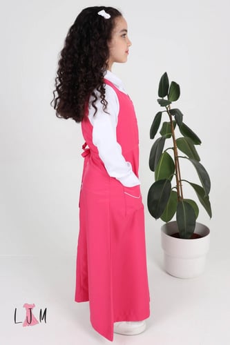 شيال مريول ابتدائي وردي موديل مميز مع كسرات 1002 ب...