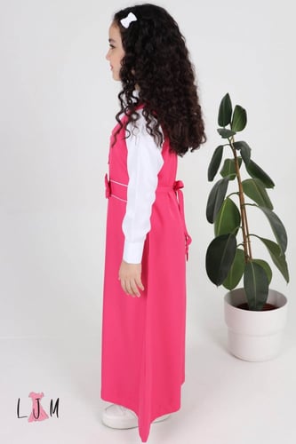 شيال مريول ابتدائي ببيونه مع حزام وازرار وردي 1001...