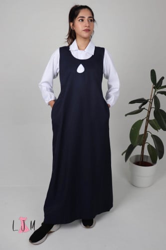 مريول كحلي شيال حركة عصرية وكسرات على الصدر