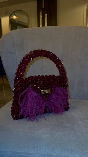 Mini dark purple feather