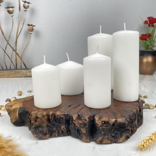 A set of cylindrical candles of various sizes, 5 pieces