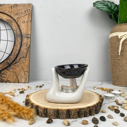 Ceramic diffuser in the shape of a hand