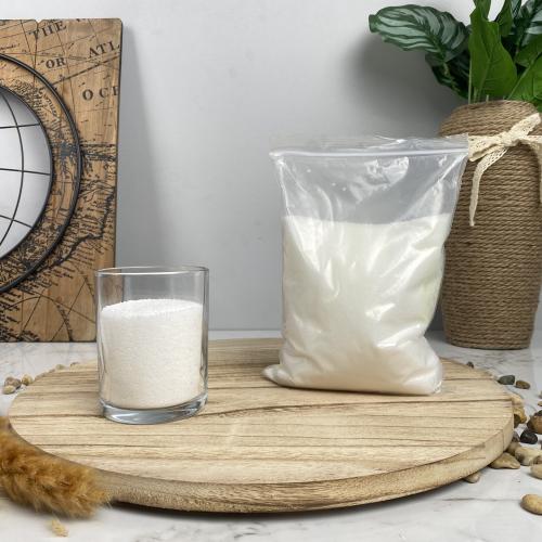 White sandy candle