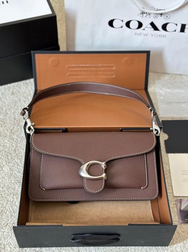 كوتش تابي - بني