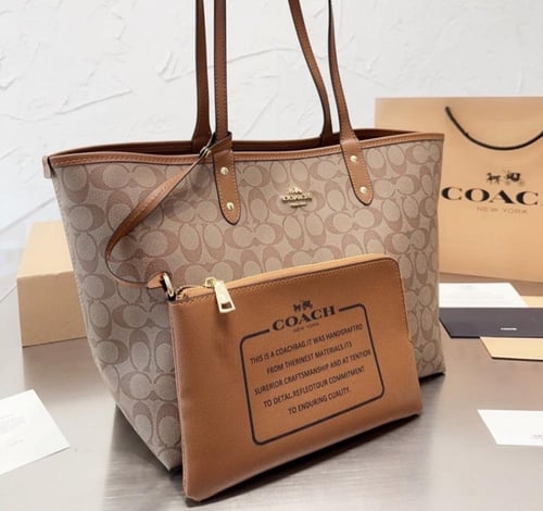 شنطة كوتش دبل فيس