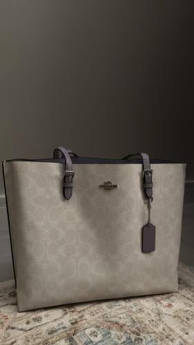 شنطة كوتش بنفسجي L