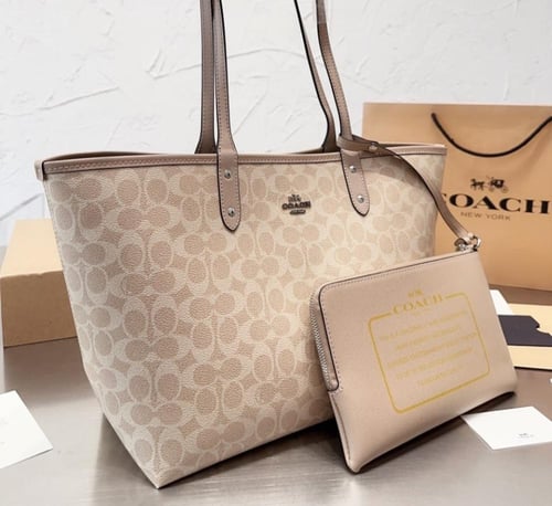 شنطة كوتش دبل فيس